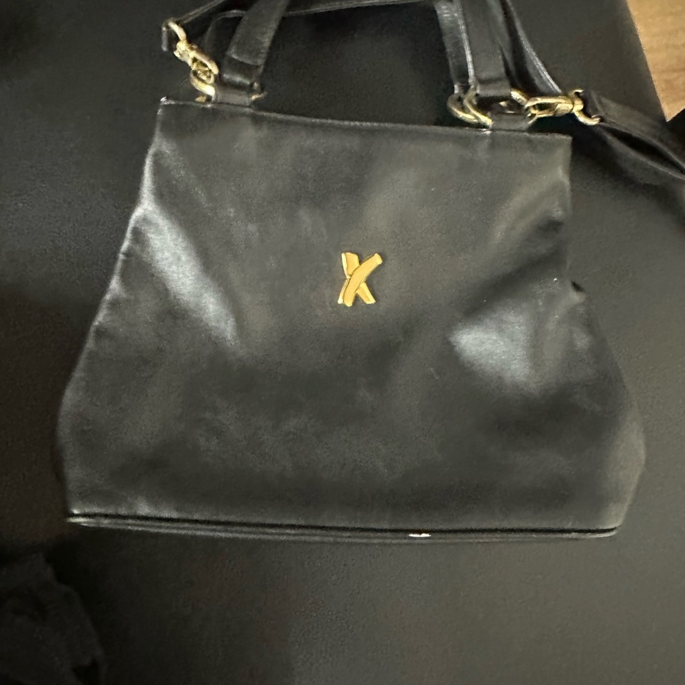 Chic Black Shoulder Bag with Gold Accent